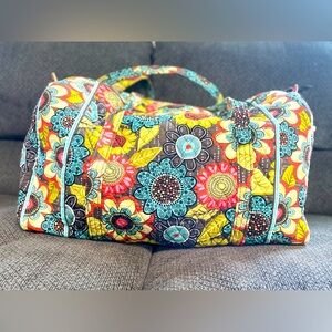 Vera Bradley weekender travel bag, multi color flowered print, one side pocket
